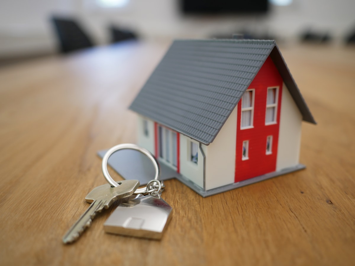 Real estate agent handing over keys to new homeowner