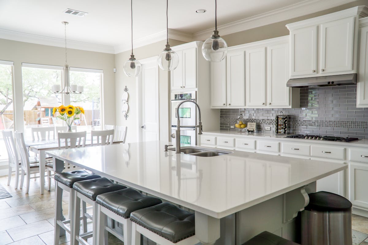 Modern kitchen in a sustainable home with energy-efficient appliances and natural light
